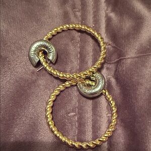 Elegant Gold and Silver authentic Balenciaga interlocking Hoop Earrings.